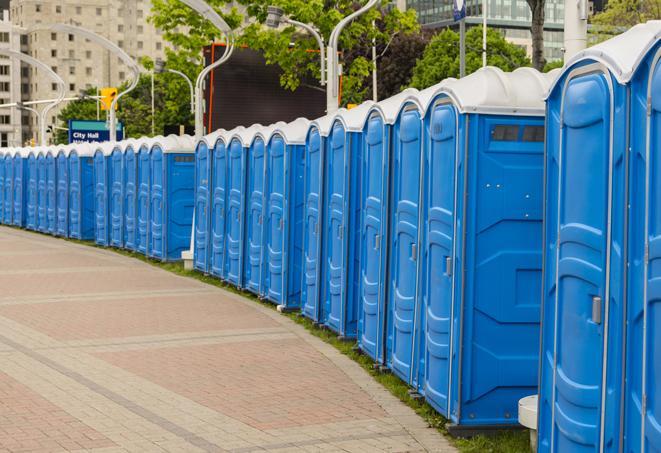 a row of portable restrooms at a fairground, offering visitors a clean and hassle-free experience in socorro